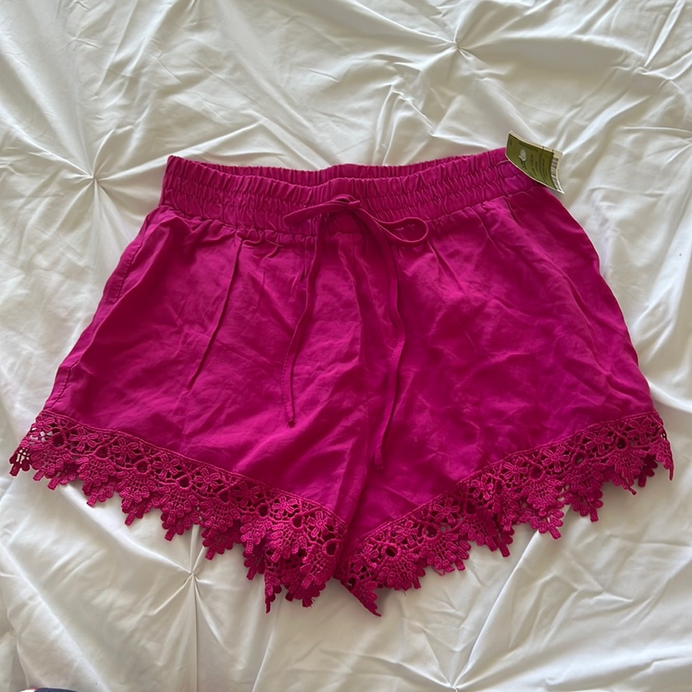 Pink shorts with lace trim